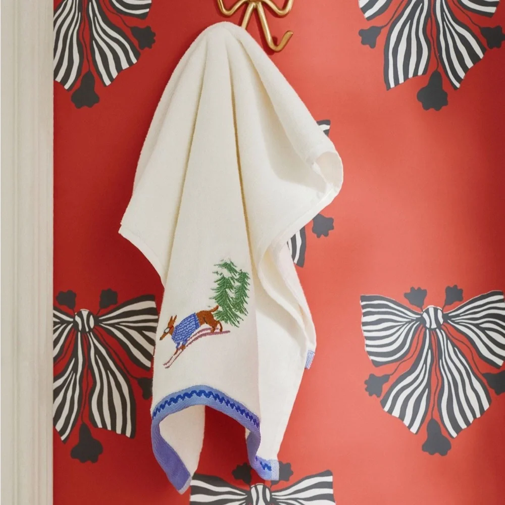 New! Anthropologie Holiday Critters Embroidered Hand Towel in white.